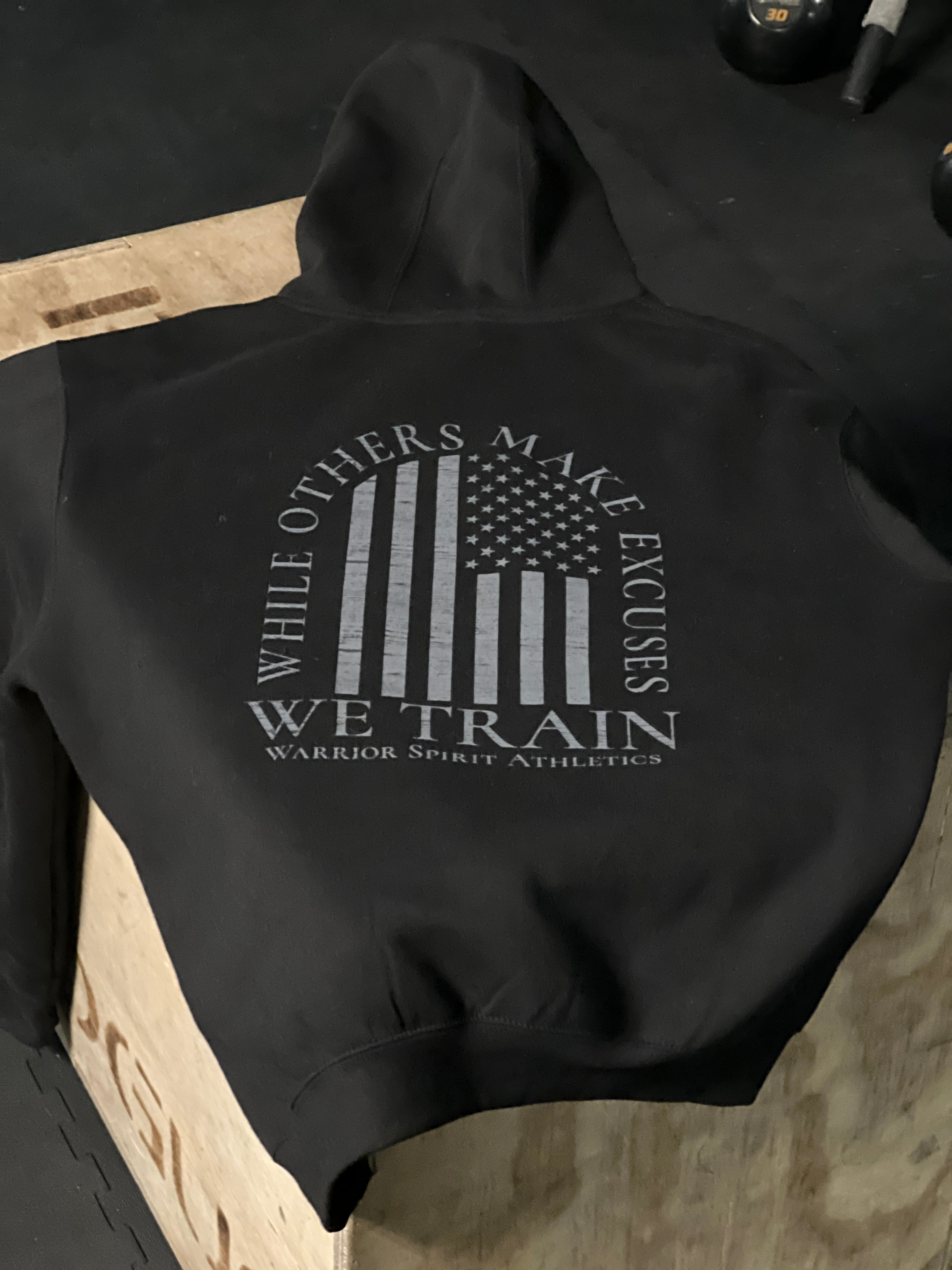 Black sweatshirt with WSA branding and American flag design